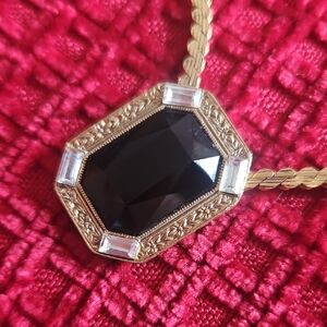 1928 Elegant Gold and Black Pendant Necklace